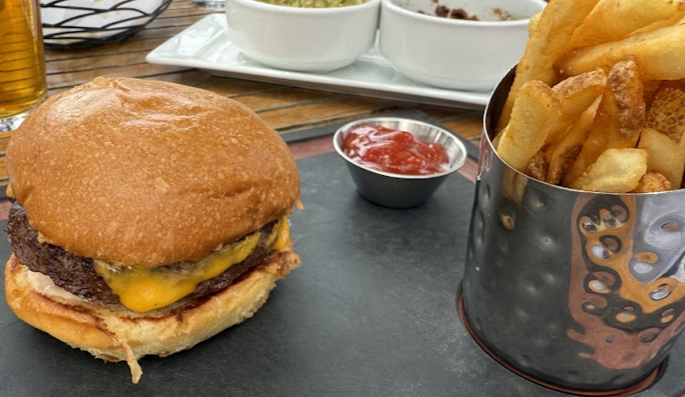 The Vig signature dishes Genuine CheeseburgerGrilled Chicken ChoppedChicken Wings